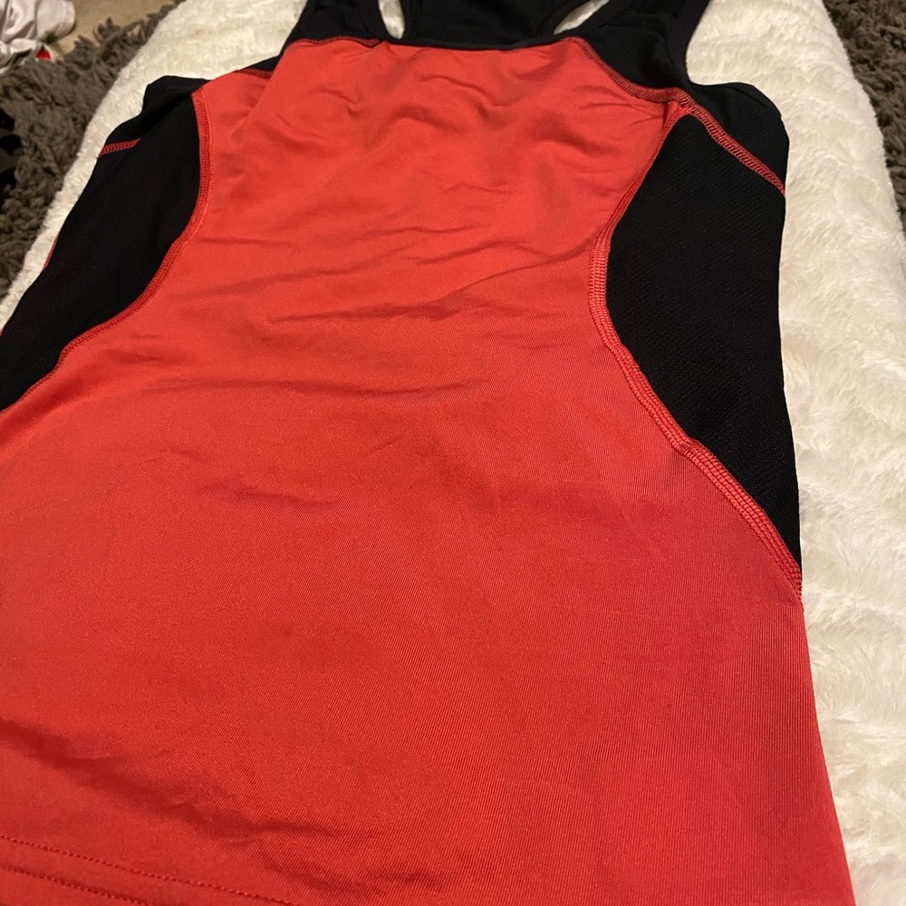 Red Reebok tank